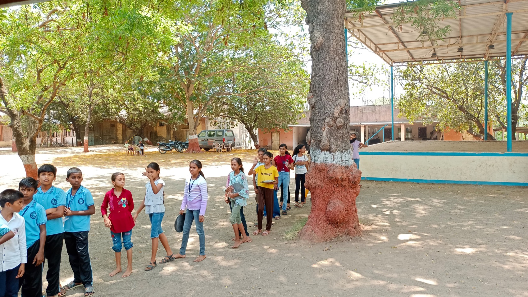Gathering under the big tree